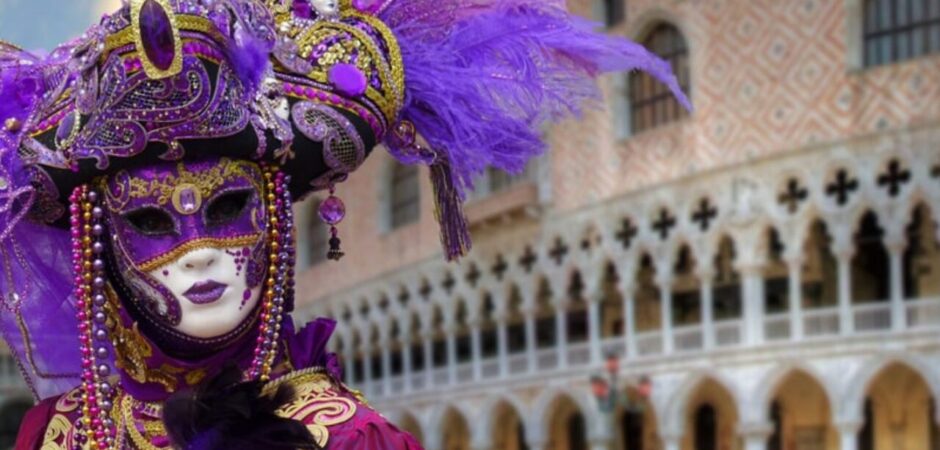 Venetian Carnival masks and costumed figures in Venice during Carnevale, Italy, celebrating tradition and festivity.