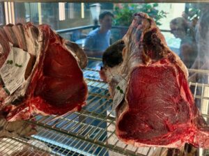 Traditional Bistecca alla Fiorentina stake featured on authentic Florence food tour