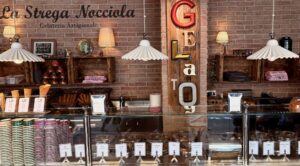 authentic Italian gelateria with traditional gelato containers