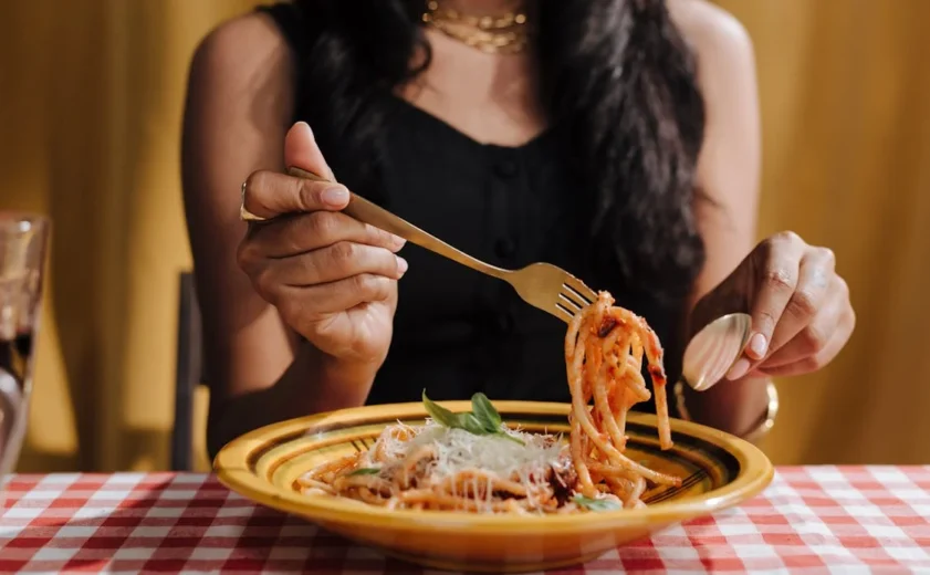 Enjoying authentic Italian pasta during a food experience in Italy. food tour vs cooking class