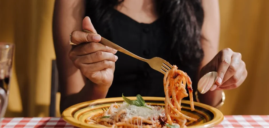 Enjoying authentic Italian pasta during a food experience in Italy. food tour vs cooking class