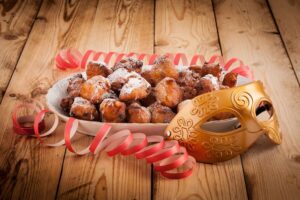 raditional Venetian Carnival sweets like frittelle and galani available during Carnevale in Venice.