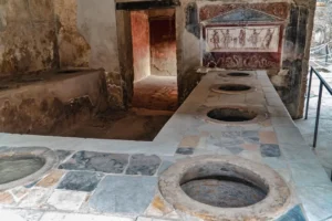 Ancient Roman thermopolium street food counter in Pompeii